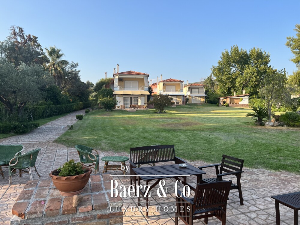 Exclusive Beachfront Estate with Three Independent Luxury Villas and Private Beach in Malakonta, Eretria image