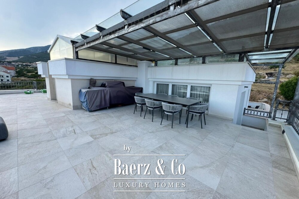 Brač, Bol, luxury penthouse in the town centre and building plot with building permit image