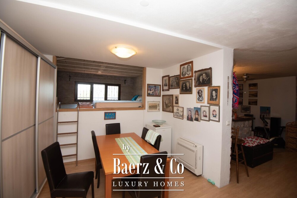 Tisno, exclusive seafront apartment house with panoramic sea views and a boat image