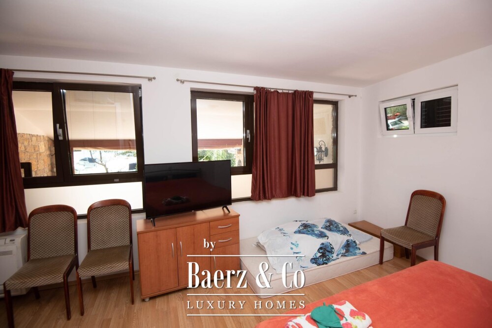 Tisno, exclusive seafront apartment house with panoramic sea views and a boat image