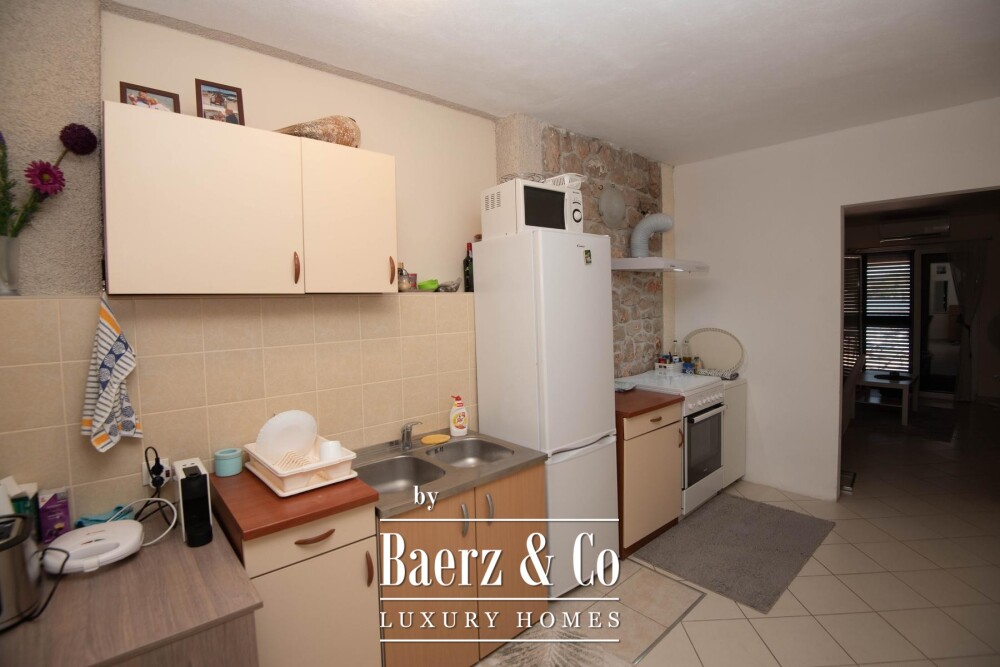 Tisno, exclusive seafront apartment house with panoramic sea views and a boat image