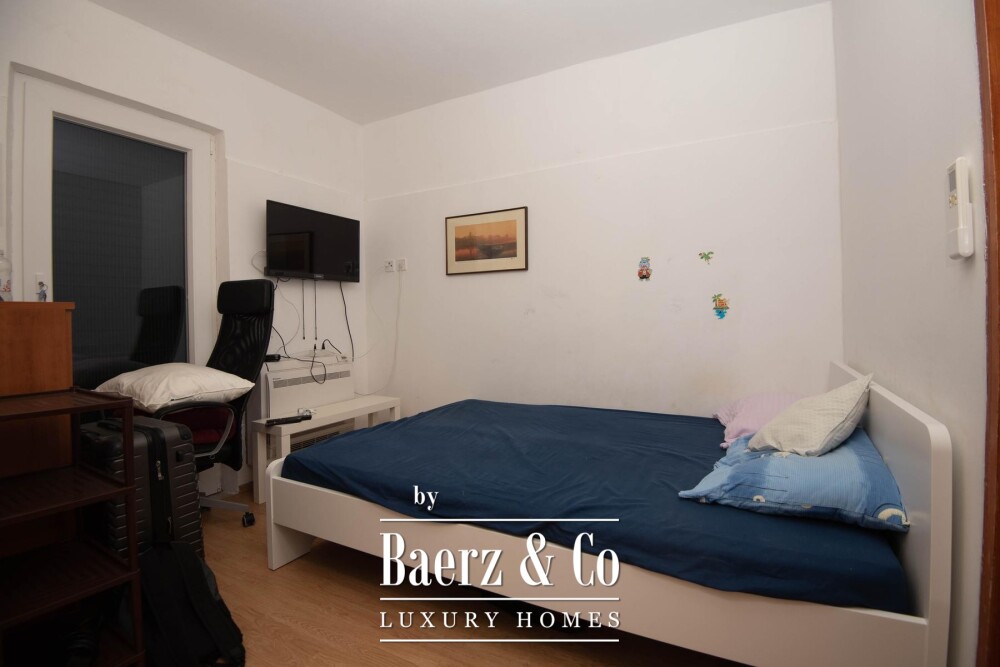 Tisno, exclusive seafront apartment house with panoramic sea views and a boat image