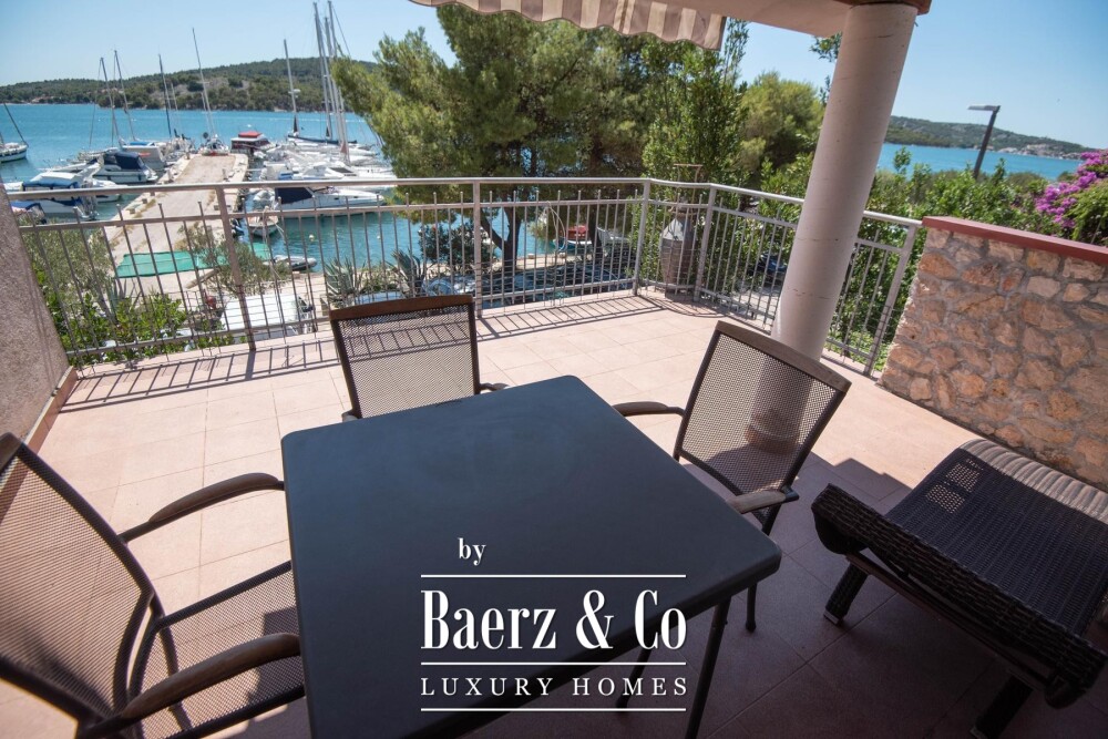 Tisno, exclusive seafront apartment house with panoramic sea views and a boat image