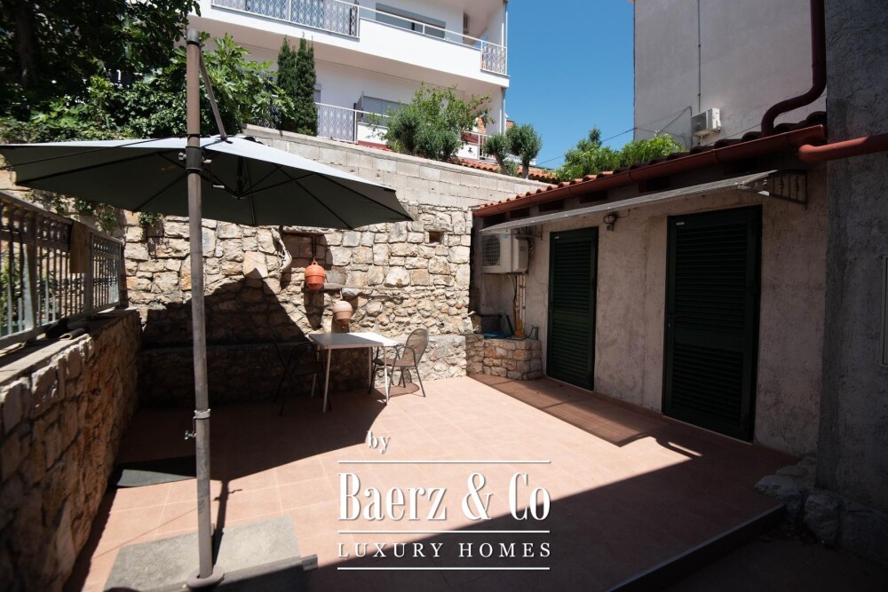 Tisno, exclusive seafront apartment house with panoramic sea views and a boat image