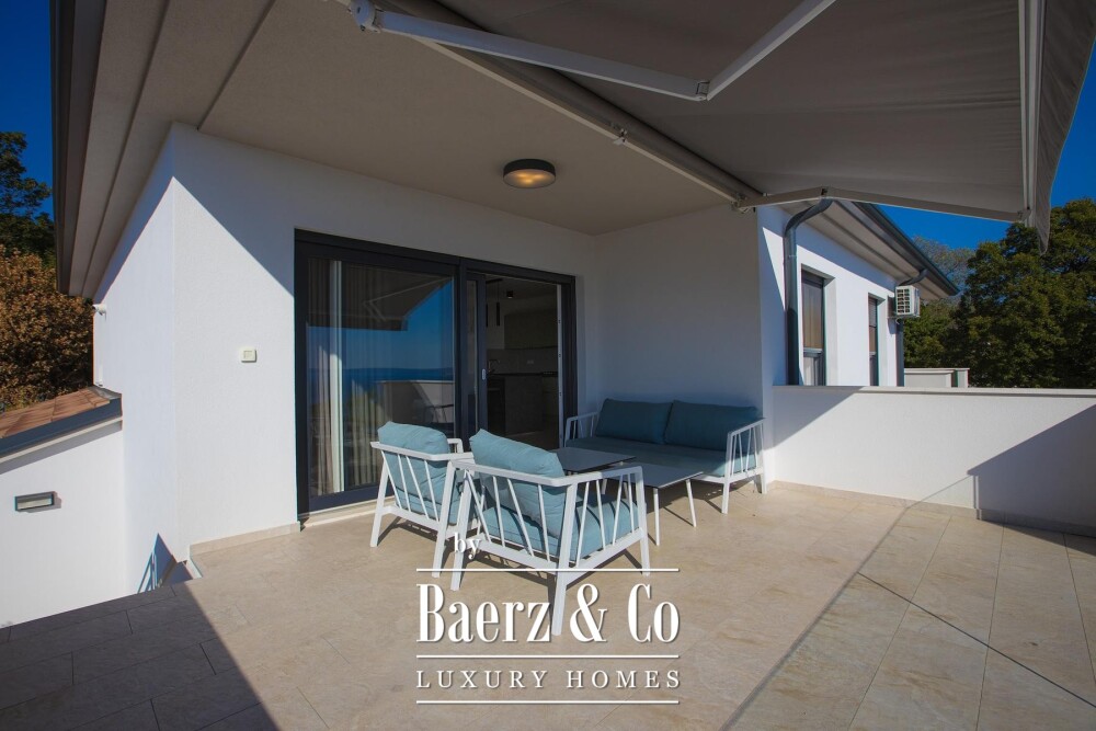 Kostrena, a house with a swimming pool and a stunning open sea view image