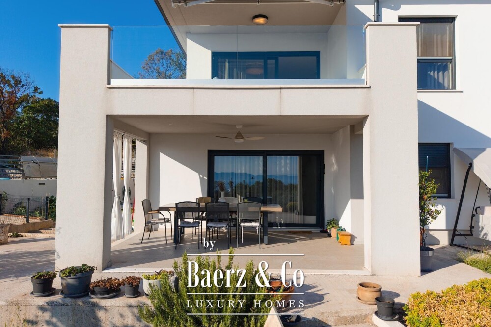 Kostrena, a house with a swimming pool and a stunning open sea view image