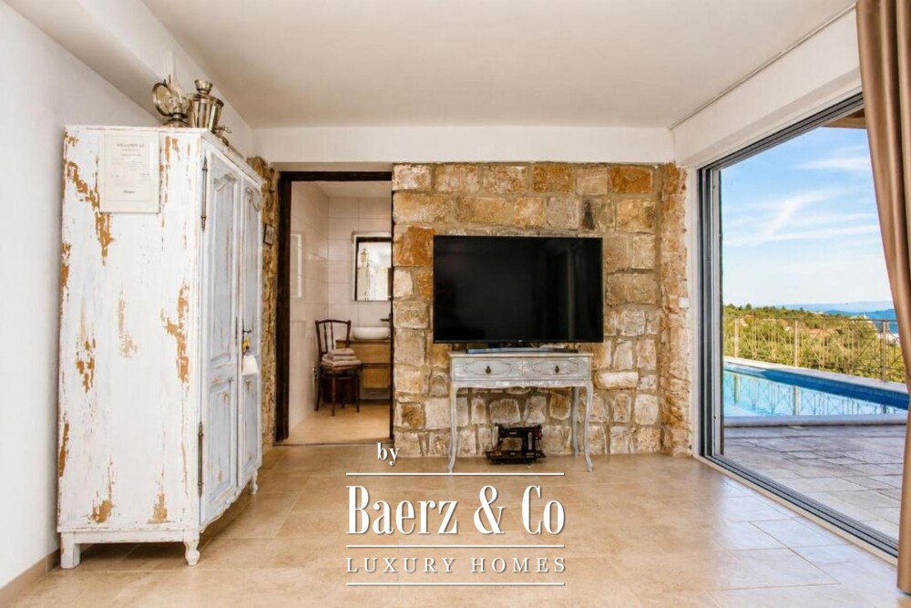 Trogir area, stone villa with a swimming pool and a Mediterranean garden image